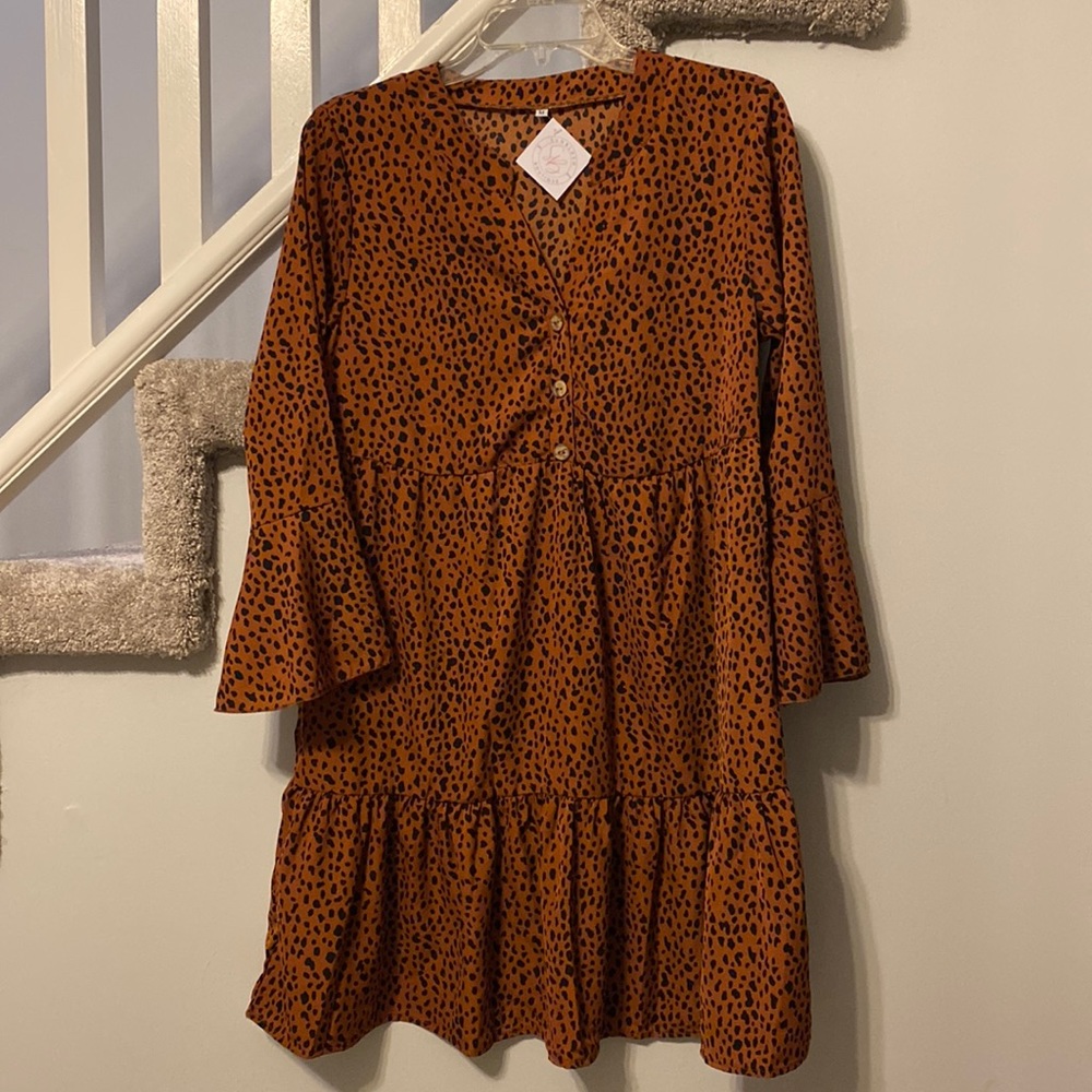 Boutique:Cheetah print brown with black spots, Bell sleeve dress never worn